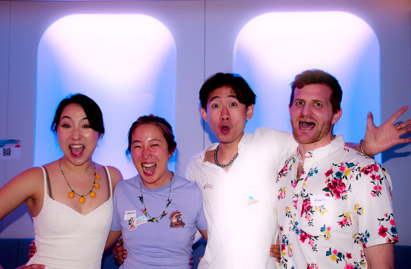 The four-person Tripals team celebrating at the launch party